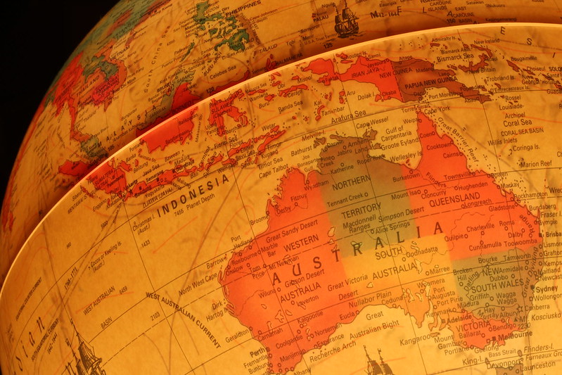 A close up of a globe, focused on Indonesia and Australia.